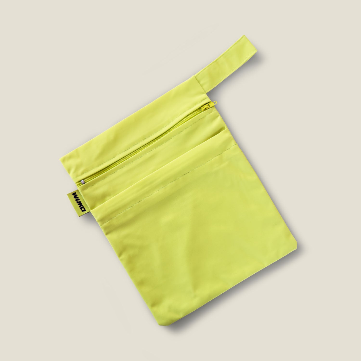 WUKA lime punch dual-pocket period changing bag, water-resistant and compact, ideal for keeping clean and dirty period pants separate