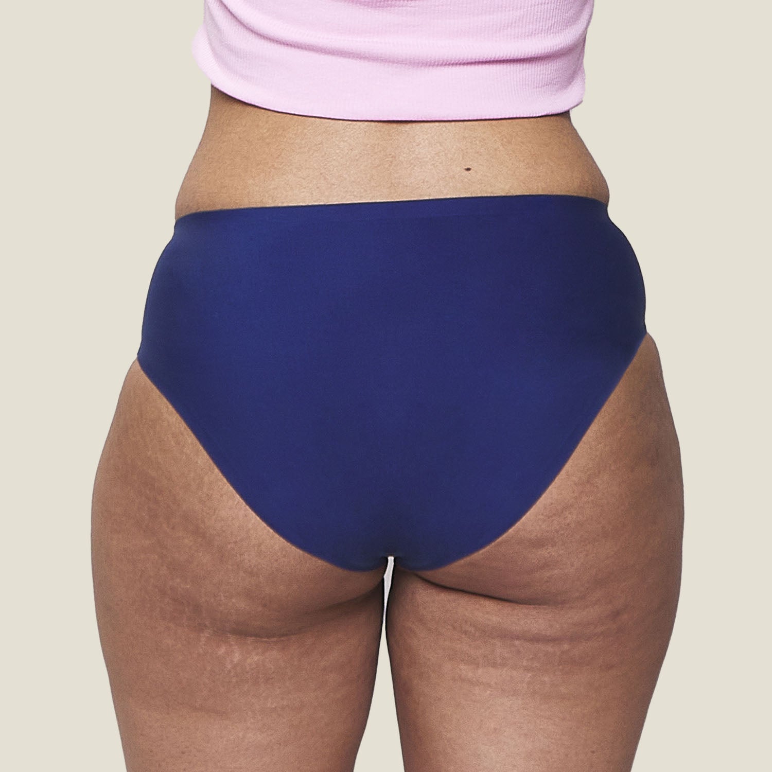 Back view of WUKA Teen Stretch Seamless Heavy Flow underwear in blue, designed for teens with a smooth, seamless finish and high-coverage fit.