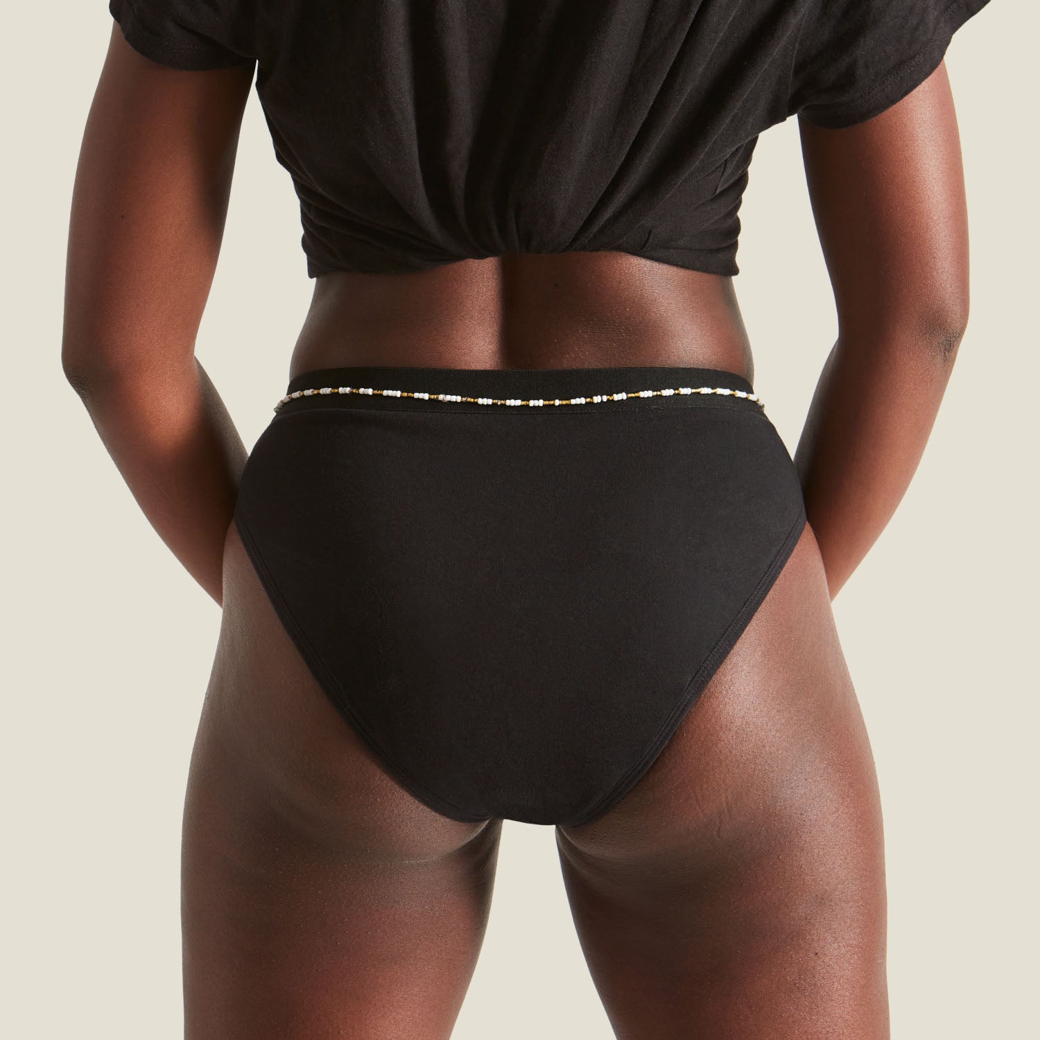 Back view of WUKA Ultimate™ Bikini Period Pants for medium flow, highlighting full coverage and seamless comfort.